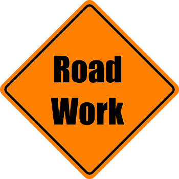 Orange diamond Road Work sign